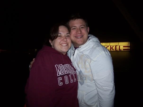 Trey and I on a sand volleyball court